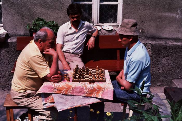 My grandfather, on the left, while playing against uncle
